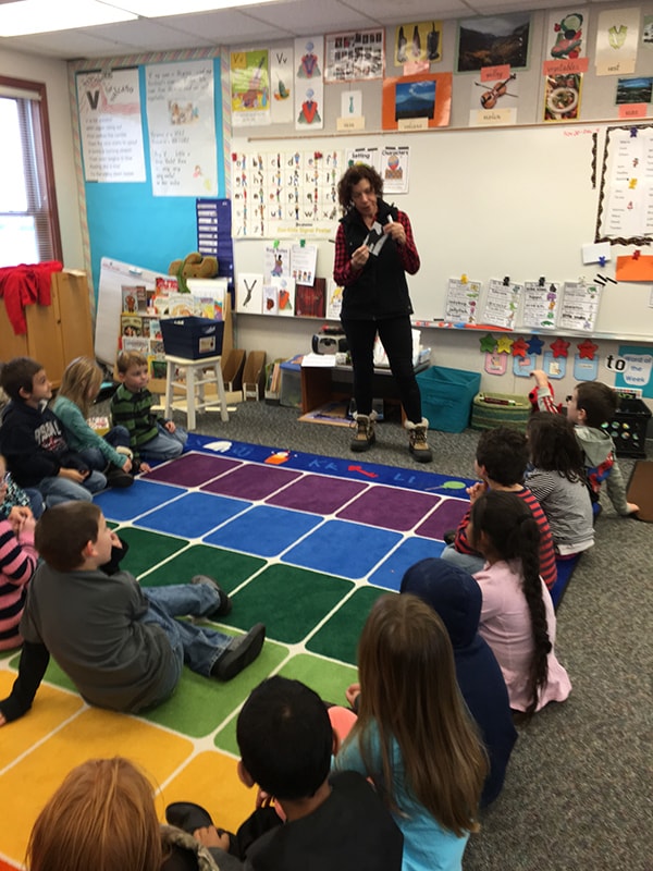 Artists in Education — artist presenting to elementary school students in classroom